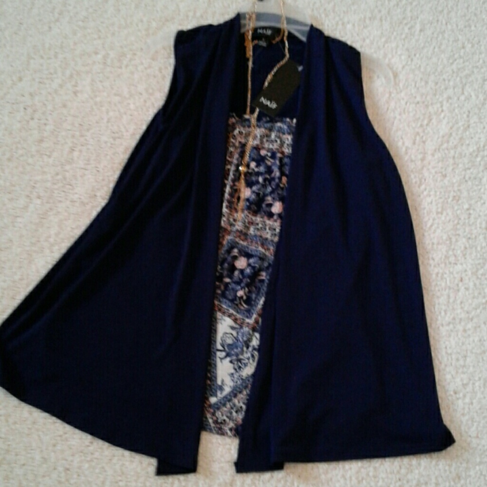 Sleeveless one piece dark blue  top.
